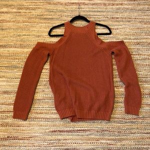 Cold shoulder sweater. Burnt orange color